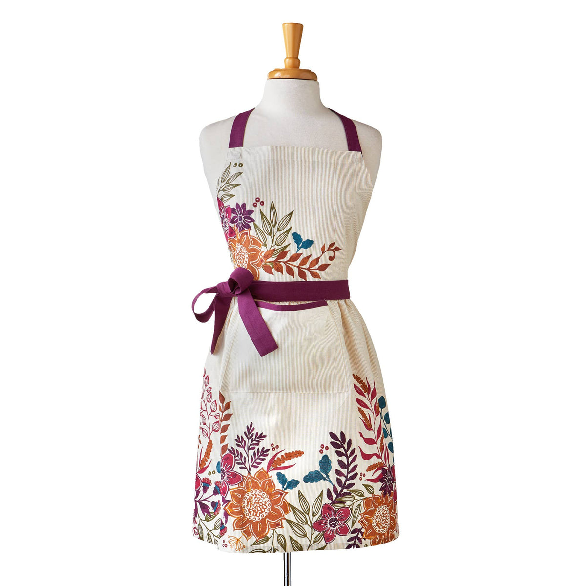 Floral apron on a mannequin against a white background